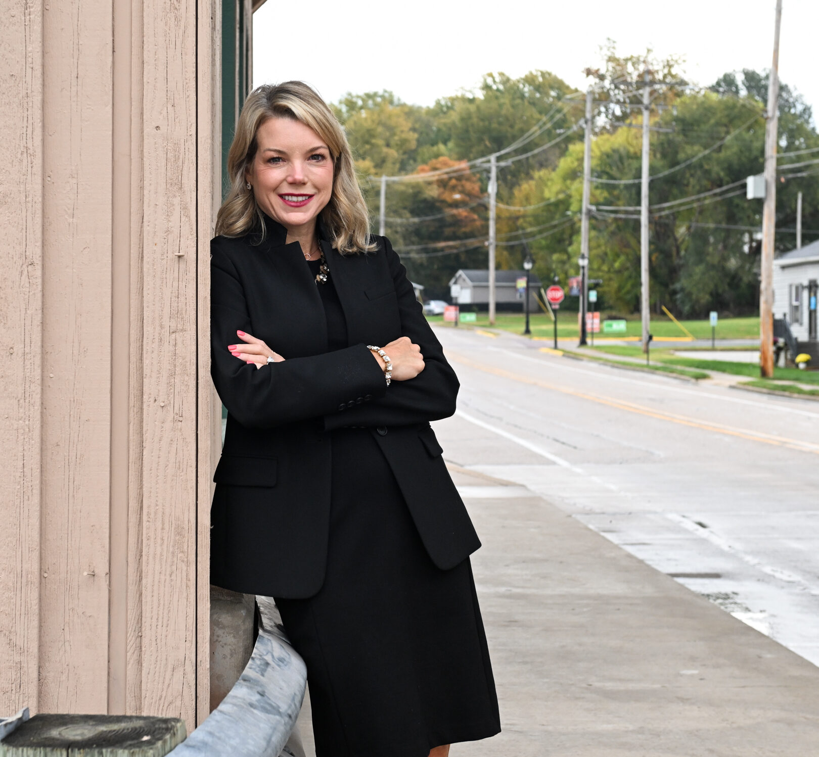 Senator Harriss stands under Glen Carbon Covered Bridge